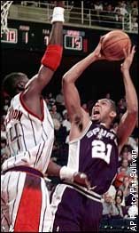 Hakeem Olajuwon and Tim Duncan