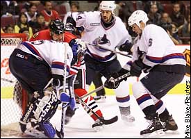 Kevin Weekes,  Adrian Aucoin, Todd Bertuzzi, Wendel Clark